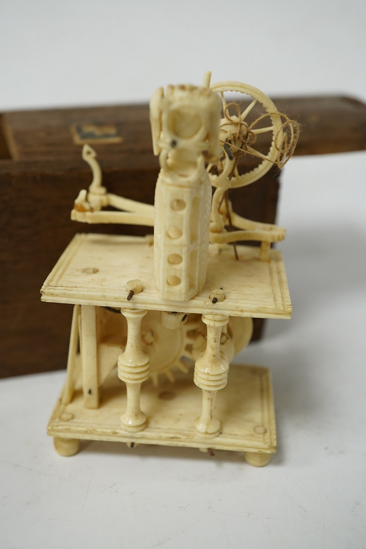 A 19th century prisoner of war carved bone Spinning Jenny, boxed. Condition - poor